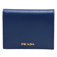PRADA 經典金色字母浮雕LOGO水波紋雙色牛皮暗釦短夾(藏藍X水藍)