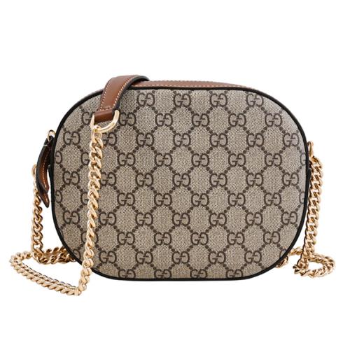 GUCCI 779784 GG Supreme 塗層印花LOGO斜背相機包.駝/咖