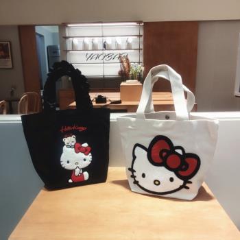 日本HelloKitty帆布包女手拎小包購物袋休閑可愛學生手提包便當包