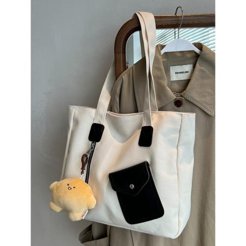 帆布包小眾設計ins風托特包女大學生上課單肩包通勤大容量手拎包