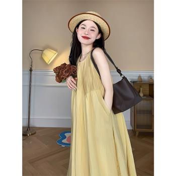 法式寬松無袖連衣裙絕美海邊度假高階輕奢女裝黃色戰袍裙子女夏季