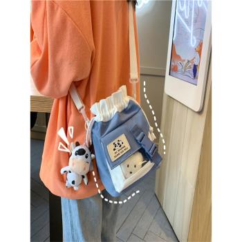 MK XK可愛小包包2023新款夏季日系少女帆布斜挎包學生單肩水桶包