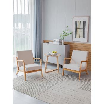現代簡約實木休閑椅單人沙發客廳臥室陽臺布藝北歐原木風格小椅子