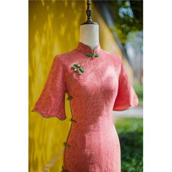 橘紅色旗袍新款2023女夏季新中式改良年輕款少女連衣裙提花中長款
