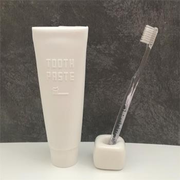 日本可反復用硅膠牙膏套包裹牙膏用白色套子可調節寬度牙膏盒
