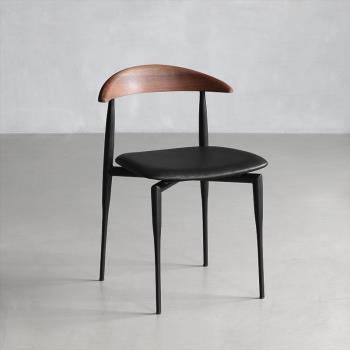 北歐輕奢餐椅家用現代簡約設計師鐵藝意式極簡設計感表情餐桌椅子
