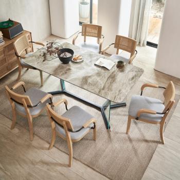 意式輕奢設計師巖板餐桌家用大戶型現代簡約長方形飯桌藤木椅組合
