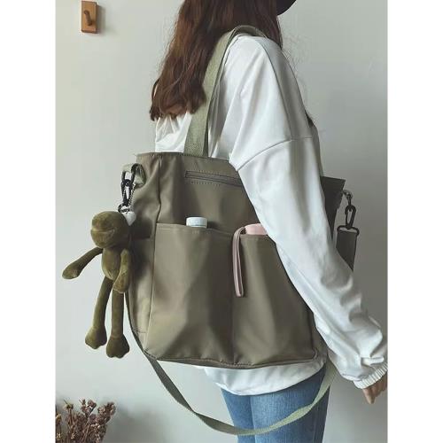 防水帆布包包女大容量2024新款單肩包托特包大包斜挎百搭ins學生