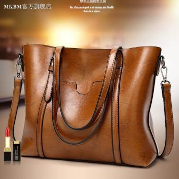 法國MKBM輕奢真皮女包2025新款大容量斜挎牛皮簡約百搭通勤托特包