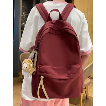 2023新款純色書包女初中女生高顏值輕便雙肩包高中大學生旅行背包