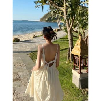 三亞拍照沙灘裙女夏海邊度假旅游吊帶露背連衣裙高級感法式海灘裙