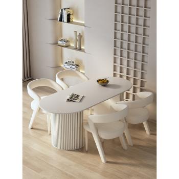 奶油風巖板餐桌椅組合現代簡約家用小戶型輕奢橢圓形白色一桌四椅