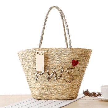 .Japanese hand-embroidered sequins hand-held grass woven bag