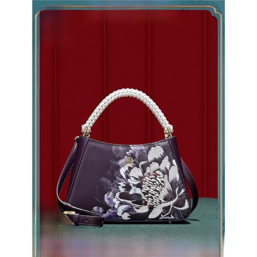 古伊西高級感大牌中國風原創真皮刺繡串珠媽媽手提斜挎包腋下包女