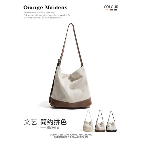 橙子少女帆布包文藝大學生上課水桶包2025新款簡約百搭單肩托特包