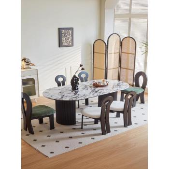 大理石餐桌現代簡約黑色輕奢實木奢石橢圓形法式復古寶格麗餐桌椅