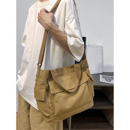 帆布包男學生大容量手提袋韓版潮牌斜挎包男款休閑郵差包女單肩包