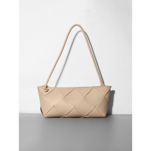 法棍手拎包2026新款真皮牛皮編織腋下包單肩斜挎百搭餃子通勤女包