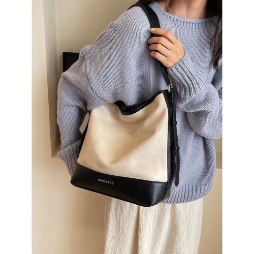 韓版休閑大容量包包女2025新款時尚撞色單肩包百搭斜挎托特水桶包