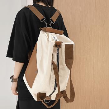 多功能簡約旅行包休閑帆布雙肩斜挎背包實用結實手提袋輕便行李包