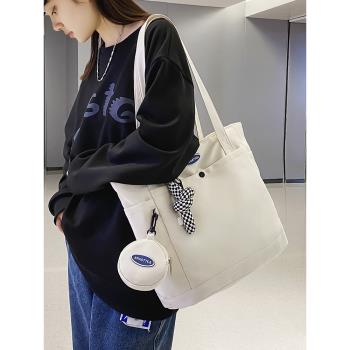 大學生上課單肩帆布包女大容量日系包包2022新款高階感通勤托特包