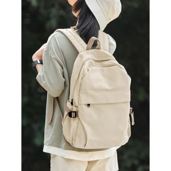 帆布雙肩包女款休閑簡約書包初中生大學生高級感旅行背包電腦包