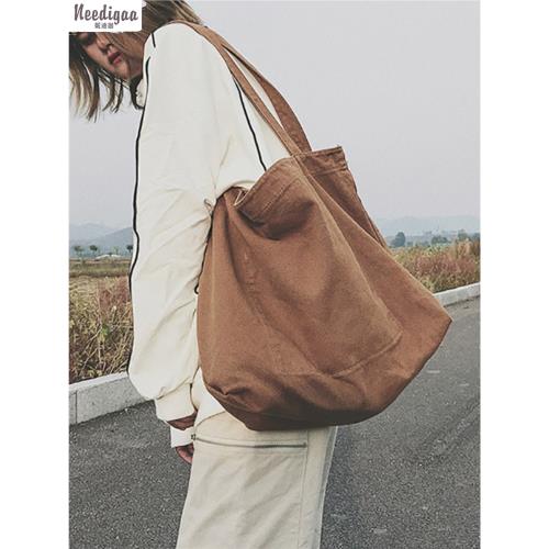 2025新款復古水洗帆布單肩包女士布袋簡約大容量旅行文藝青年背包