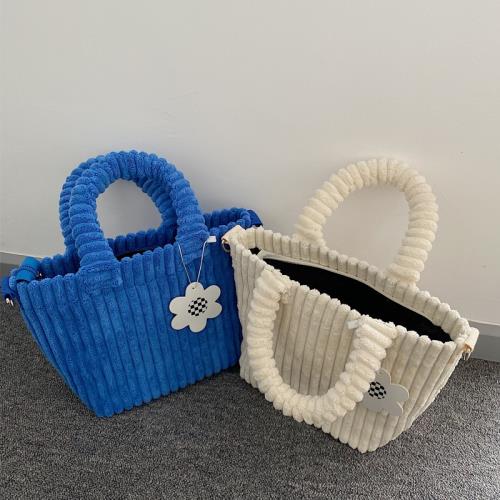 小眾燈芯絨水桶包2021新款秋冬毛絨斜挎小包可愛毛毛手提包托特包