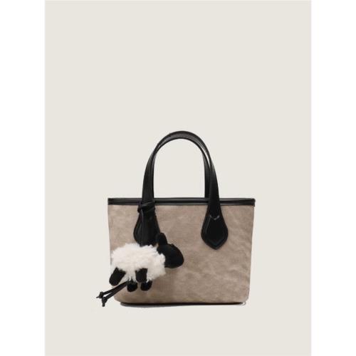 MK旗艦店包包女2023秋冬新款時尚手提水桶包小眾高級感單肩斜挎包