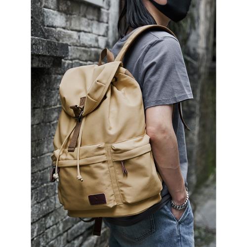 帆布雙肩包男背包休閑潮流大學生書包大容量防水旅行包簡約電腦包