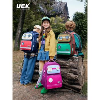 UEK小學生書包1-3一6年級2024新款護脊減負男童女孩雙肩兒童背包