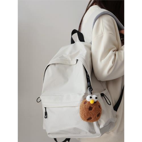 設計感書包初中女生高中大學生純色雙肩包原創小眾格子大容量背包