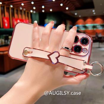 奢華氣囊愛心手腕帶蘋果13手機殼適用iphone14pro保護套12矽膠Xsmax高檔11全包邊15plus支架女Xr高階感8X粉色