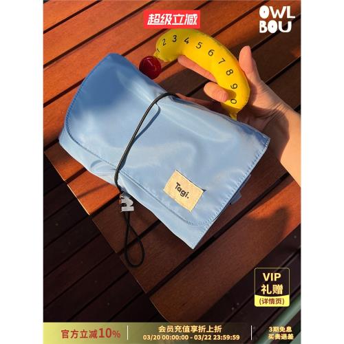 TAGI.哈兜蛋卷收納包可愛便攜可拆卸撞色旅行洗漱折疊小眾化妝包