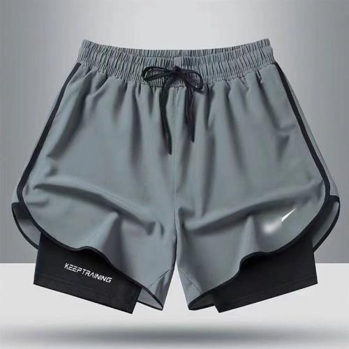 跑步短褲男運動田徑馬拉松寬松速干防走光內襯訓練健身裝備三分褲