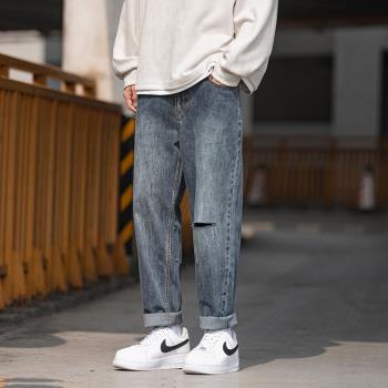 破洞秋裝新款男士水洗顯瘦牛仔褲