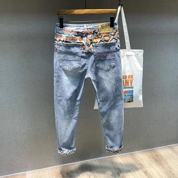 潮牌夏天破洞牛仔褲九分修身刺繡