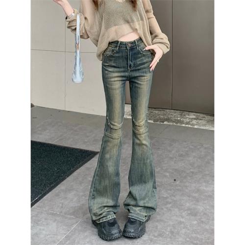 美式高街牛仔褲女裝設計感鉚釘褲子春季高腰彈力修身喇叭拖地長褲