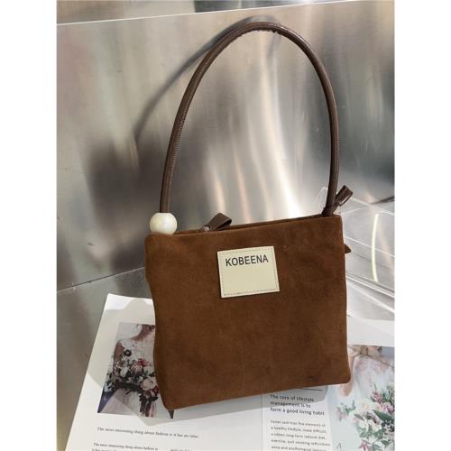 可彼娜2025新款高級感女單肩手提包小眾設計珍珠軟皮腋下斜挎包