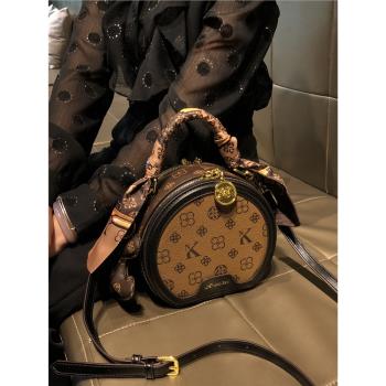 香港品牌包包女式2024新款秋冬高階感單肩小包真皮手提斜挎小圓包