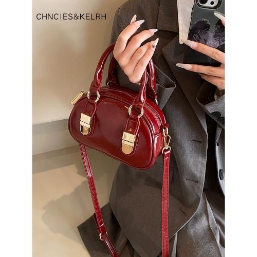 紅色手提波士頓包包女士2025新款流行高級感斜挎保齡球包包迷你包