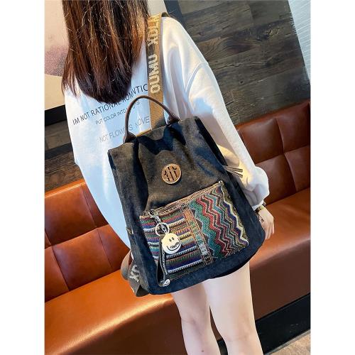 牛仔布防盜雙肩包女2025新款時尚旅游輕便背包民族風撞色潮登山包