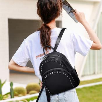真皮雙肩包女2024新款時尚百搭大容量軟頭層牛皮鉚釘旅行女士揹包