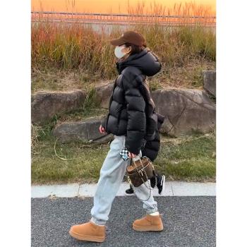 (免運)黑色羽絨服女2024冬季新款韓版高階感白鴨絨長款連帽麵包服外套女