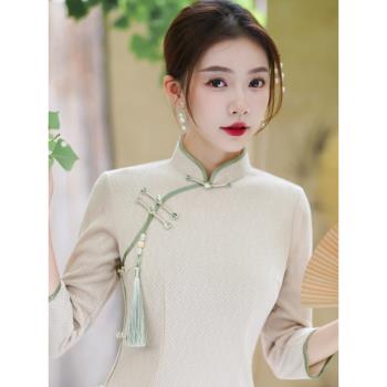 何旗2024秋冬新款加絨七分袖年輕款橙色日常改良旗袍顯瘦女連衣裙