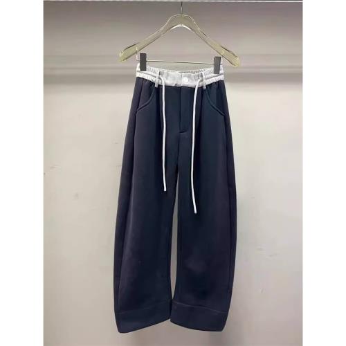 小眾2025春季新款拼接黑色運動褲女寬松彎刀垂感香蕉闊腿衛褲子