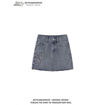 美式高街小眾設計刺繡蝴蝶牛仔半身裙短裙女包臀高腰毛邊a字裙子