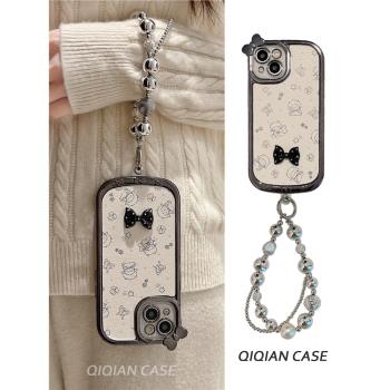 啟乾 電鍍小龍立體蝴蝶結iPhone16/15手機殼適用蘋果14/13promax皮質軟殼12腕帶手提11鏈條掛繩可愛卡通新款