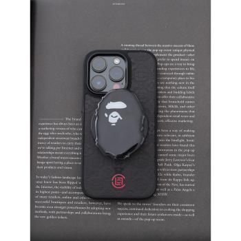 創意小眾新款手機磁吸支架趣味黑色手機桌面支撐架潮牌氣囊支架