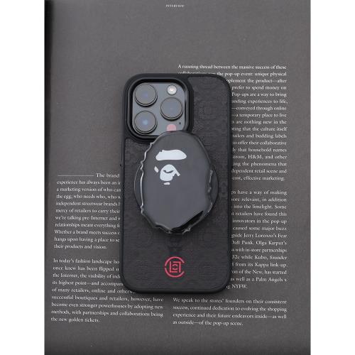 創意小眾新款手機磁吸支架趣味黑色手機桌面支撐架潮牌氣囊支架